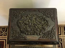 A Chinese hardwood and brass metal-mounted cabinet, late 19th/early 20th century