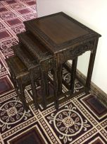 A nest of four Chinese teak side tables, 20th century