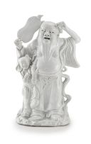 A Chinese blanc-de-chine figure of a Lohan, Qing Dynasty, 19th century
