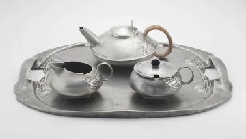 An assembled pewter tea service, Liberty & Co and W H Haseler, late 19th/early 20th century