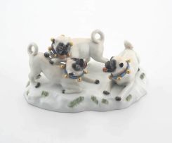 A Meissen figural group of pugs, late 19th century