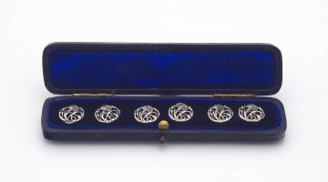 An Edward VII set of six silver buttons, James Deakin & Sons, Chester, 1902