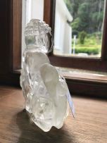 A Chinese carved quartz crystal figure of Buddha, late 19th/early 20th century