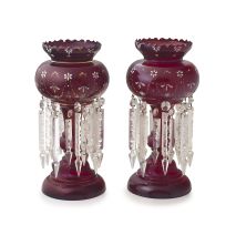 A pair of Victorian red glass and enamelled lustres