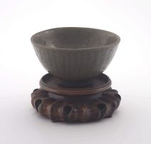 A Chinese craqueleure green-glazed bowl, Song Dynasty