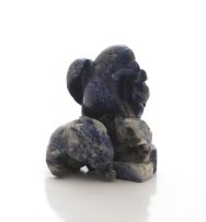 A Chinese lapis lazuli and howlite carving of a hawk and a rabbit, 20th century