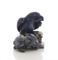 A Chinese lapis lazuli and howlite carving of a hawk and a rabbit, 20th century