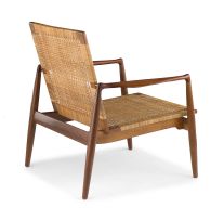 A Danish teak, oak and caned 'SW 96' easy chair designed in 1956 by Finn Juhl for Søren Willadsens Møbelfabrik