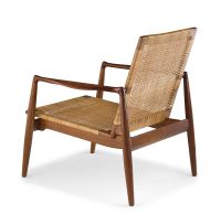 A Danish teak, oak and caned 'SW 96' easy chair designed in 1956 by Finn Juhl for Søren Willadsens Møbelfabrik