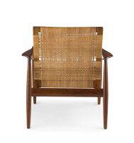 A Danish teak, oak and caned 'SW 96' easy chair designed in 1956 by Finn Juhl for Søren Willadsens Møbelfabrik