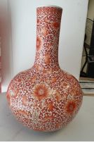 A Chinese orange and gilt bottle vase, Qing Dynasty, 19th century