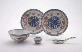 A pair of Chinese blue, white and iron-red dishes, Qing Dynasty, late 19th century