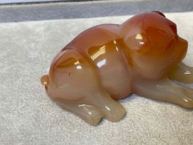 A Chinese agate carving of a pup, Qing Dynasty, 19th century