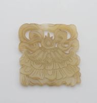 A Chinese celadon jade plaque, late 19th/early 20th century