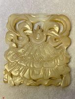 A Chinese celadon jade plaque, late 19th/early 20th century
