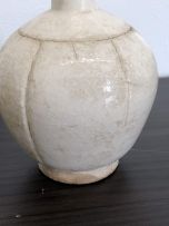 A Chinese two-handled white-glazed vase, Song Dynasty, 960-1280