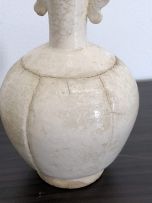 A Chinese two-handled white-glazed vase, Song Dynasty, 960-1280