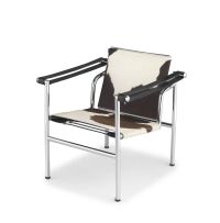 An LC1 cowhide and chrome armchair designed in 1928 by Le Corbusier, Pierre Jeannert and Charlotte Periand