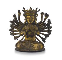 A Chinese gilt-bronze multi-armed figure of Guanyin, 17th century