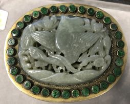 A Chinese carved reticulated celadon jade plaque, Ming Dynasty