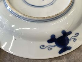 A Chinese blue and white saucer dish, Kangxi period, late 17th century