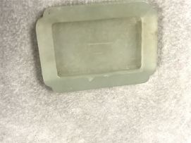 A Chinese celadon jade carving, Qing Dynasty, 18th/19th century