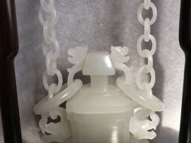 A Chinese white jade hanging vase and cover, late Qing Dynasty, 19th/20th century