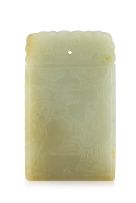 A Chinese celadon jade pendant, Qing Dynasty, 19th century