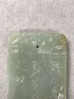 A Chinese celadon jade pendant, Qing Dynasty, 19th century