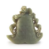 A Chinese celadon jade carving of an archaistic form, Qing Dynasty, 18th/19th century