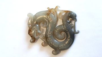 A Chinese yellow celadon jade 'archaistic' Bi disc, Qing Dynasty, 19th century