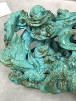 A Chinese turquoise carved figural group, Qing Dynasty, 19th century