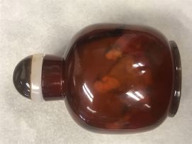 A Chinese amber glass inside-painted snuff bottle, Qing Dynasty, 19th century