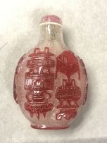 A Chinese single overlay red snowflake glass snuff bottle, Qing Dynasty, 18th/19th century