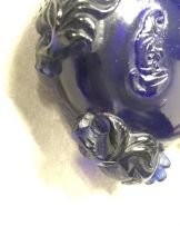 A Chinese blue glass snuff bottle, Qing Dynasty, 19th century