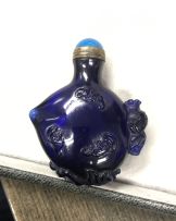 A Chinese blue glass snuff bottle, Qing Dynasty, 19th century