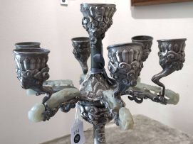 A Mongolian style engraved silver and jade-mounted seven-light candelabra, early 20th century