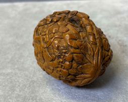 A Chinese walnut shell carving, late 19th/early 20th century