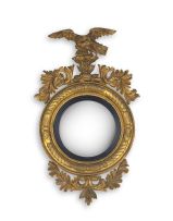 A George IV giltwood convex mirror