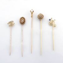 Collection of five gold and gem-set stick pins, 19th/20th century