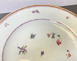 Three Chinese famille-rose plates, Qianlong period, 1735-1796
