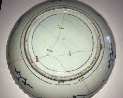 A Japanese Arita blue and white dish, Edo period, 17th century