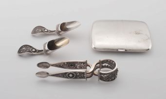 A pair of German silver tea caddy spoons and a pair of sugar tongs, .800 standard, late 19th/early 20th century