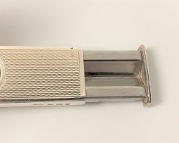 An Elizabeth II silver cigar guillotine cutter, William H Manton, Birmingham, 1976