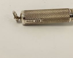 An Edward VII silver cheroot holder and case, Oppenheimer, Seckel & Co, Birmingham, 1906