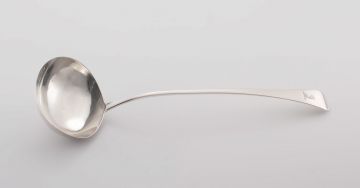 A George IV silver 'Old English' pattern soup ladle, maker's marks indistinct, R*, London 1835