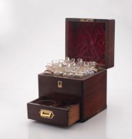 A Regency brass-bound mahogany doctor's travelling apothecary box