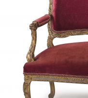 A Louis XVI style gilded and upholstered settee