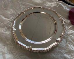 A set of twelve Elizabeth II silver dinner plates, SA Ld, London, 1964, .925 sterling