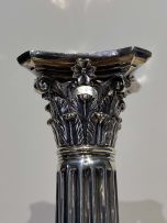 A pair of George III silver Corinthian candlesticks, Emick Romer, London, 1762